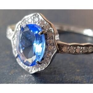 Elegant Rhodium-Plated Size 9 Ring with Blue Gemstone and Pave Halo
